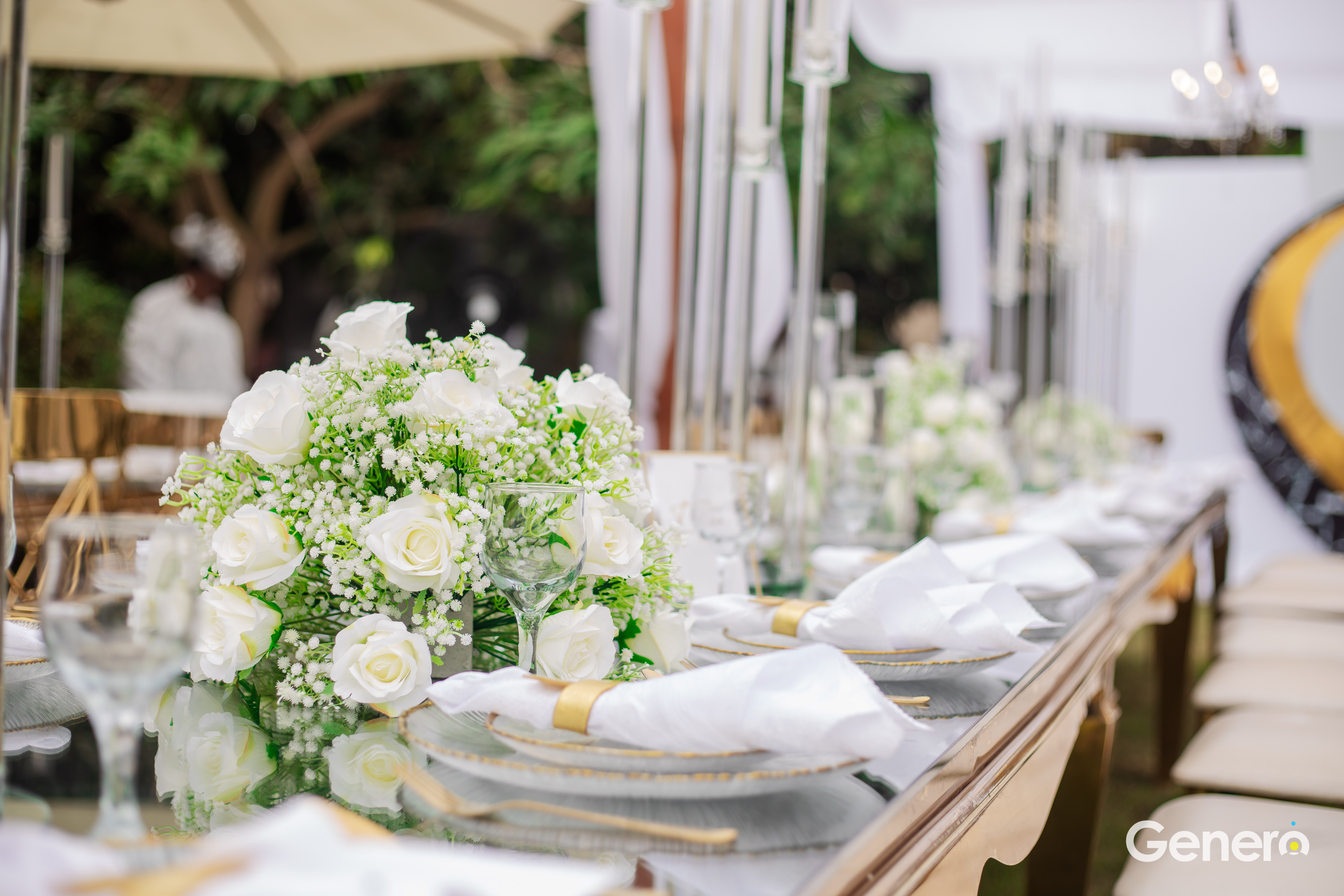 Elegant birthday table setting with festive decor, highlighting vibrant tableware and arrangement.