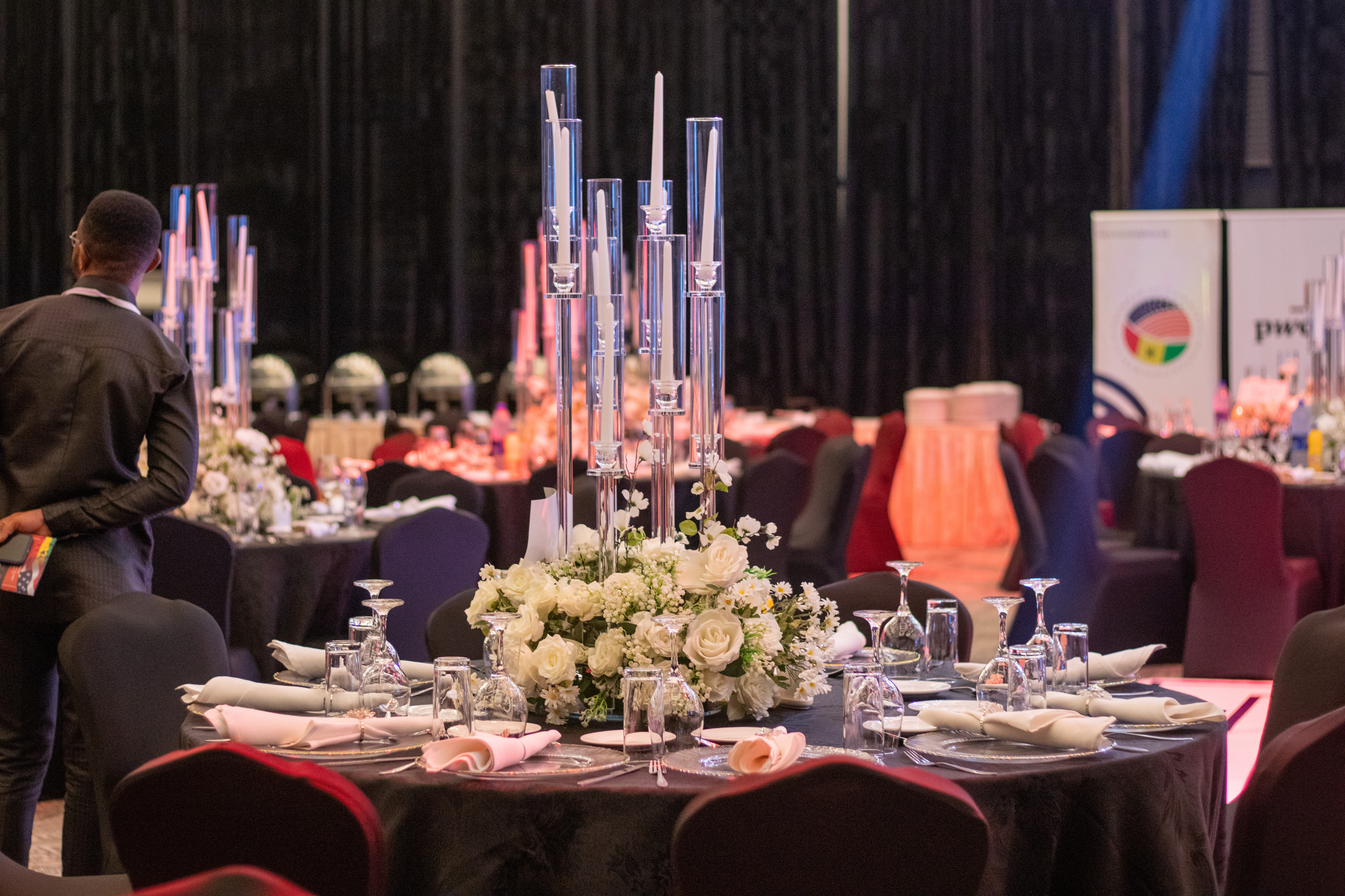 Corporate event decor featuring a modern table setting with professional design elements.